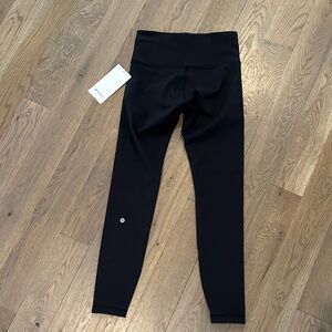Women’s size 6 NWT Black
Lululemon Wunder Under Train HR 28”